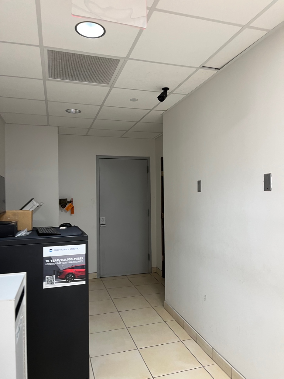 Hallway security camera installation back office auto dealership Poughquag NY